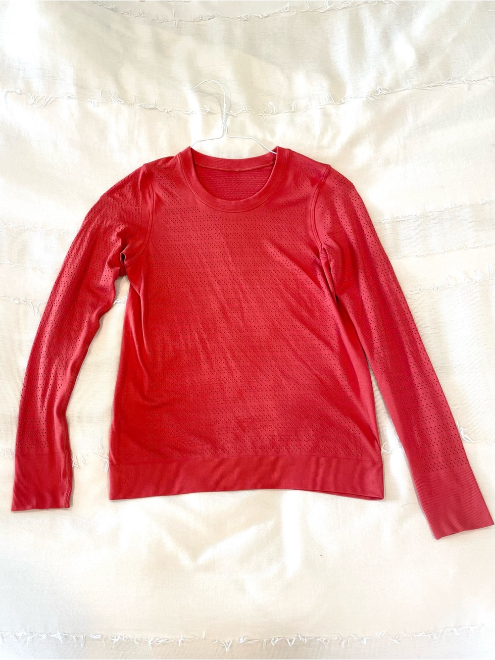Lululemon mesh long sleeved workout top in coral.